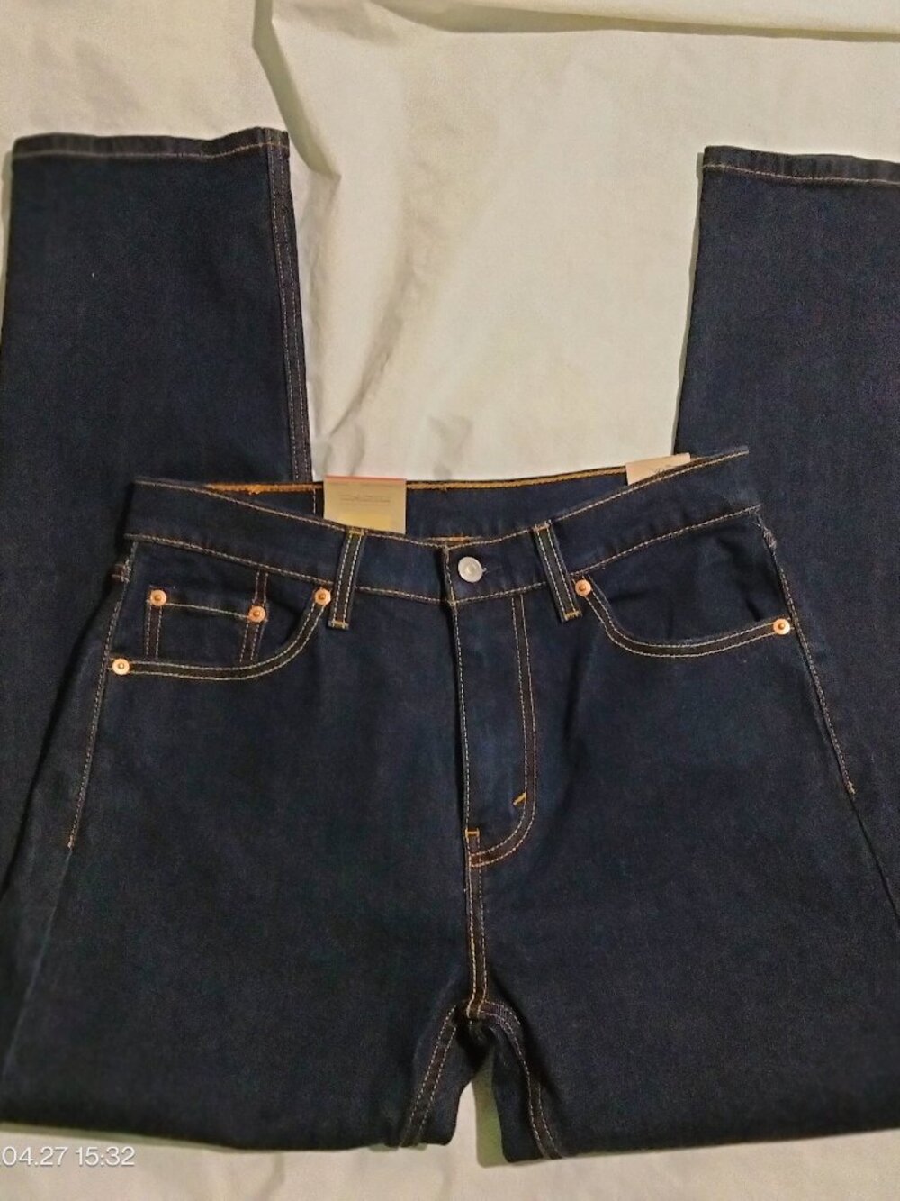 Note a minor horizontal "storage rub" or light fading streak on the lower leg (s